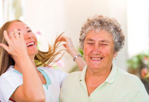 Caregiver laughing Caregiver laughing